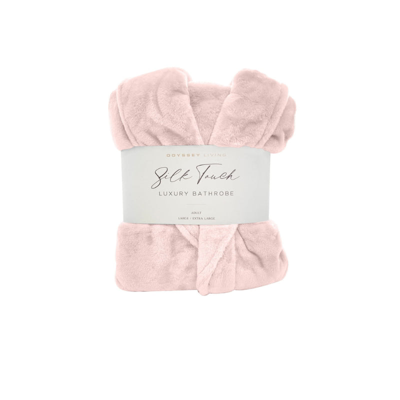 A front details of a neatly folded blush silk touch bathrobe, exuding luxurious elegance and comfort.
