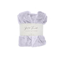  A front details of a neatly folded lilac silk touch bathrobe, exuding luxurious elegance and comfort.