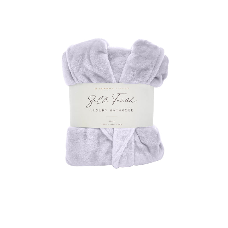  A front details of a neatly folded lilac silk touch bathrobe, exuding luxurious elegance and comfort.