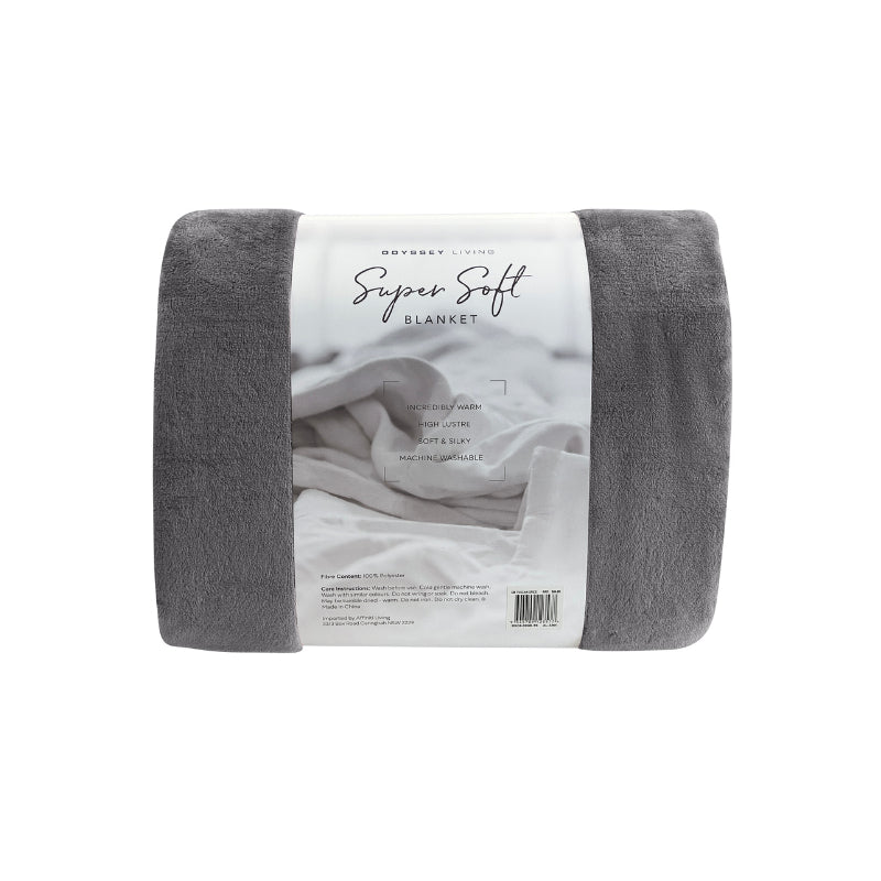 Back packaging details of the charcoal Odyssey Living Super Soft Blanket creating the perfect setting to cosy up in the luxurious comfort and warmth of the bed.