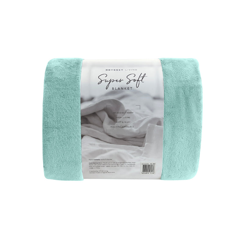 Back packaging details of the blue Odyssey Living Super Soft Blanket creating the perfect setting to cosy up in the luxurious comfort and warmth of the bed.