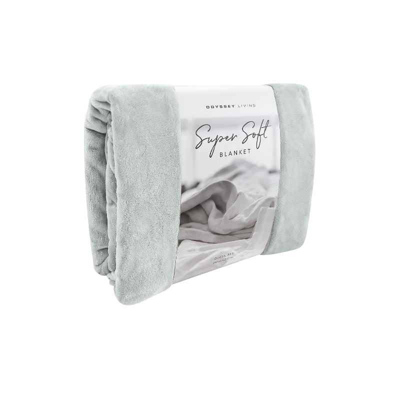 Side packaging details of the silver Odyssey Living Super Soft Blanket creating the perfect setting to cosy up in the luxurious comfort and warmth of the bed.