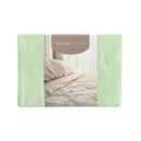 Front packaging details of a clean and classic light green bed with matching sheets and pillows, made of 100% microfibre for a soft and warm feel.