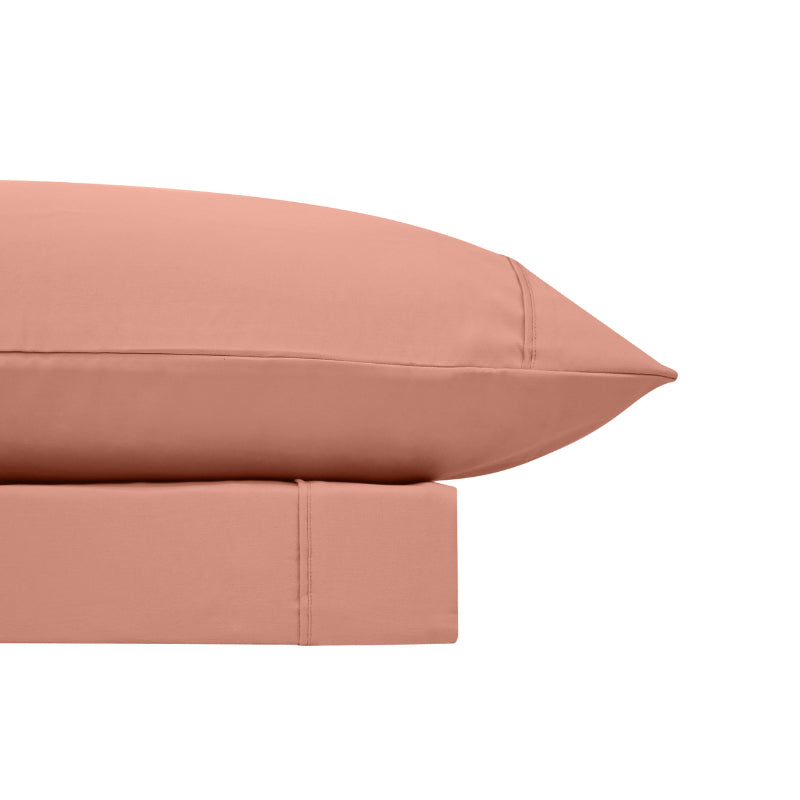 A clean and classic orange bed sheets and pillows, made of 100% microfibre for a soft and warm feel.