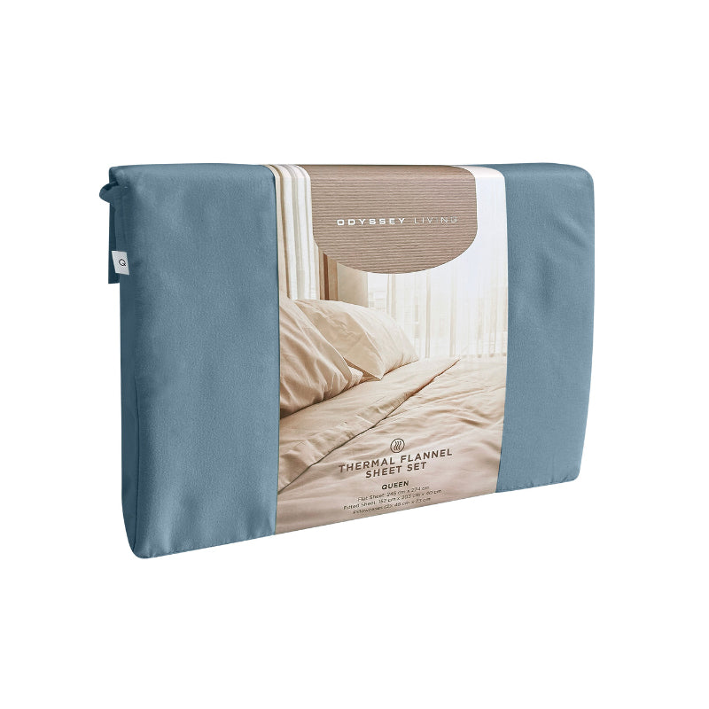 Side packaging details of a clean and classic blue bed with matching sheets and pillows, made of 100% microfibre for a soft and warm feel.