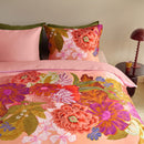 Side angle of the Livia Quilt Cover styled with natural light and earthy décor