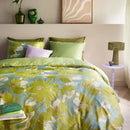 Reversible side of the quilt cover showing the soft geometric green pattern