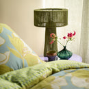 Close-up of the green floral pattern and matching pillowcases on quilt cover