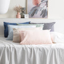 Park Avenue flannelette sheet set styled in soft pastel colours on a white bed