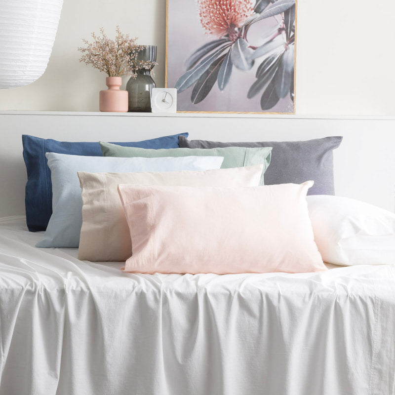 Park Avenue flannelette sheet set styled in soft pastel colours on a white bed
