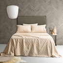 Egyptian cotton flannelette sheet set in ginkgo leaf pattern on a bed