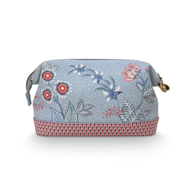 alt="A back view of a light blue medium cosmetic purse with a vibrant floral pattern."