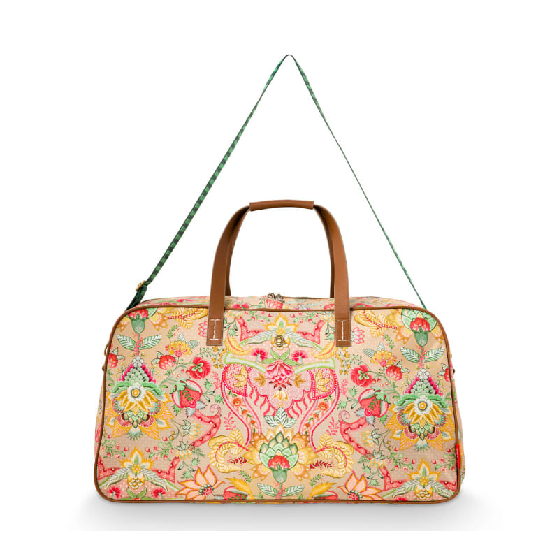 alt="Stylish yellow travel bag with ample storage space and intricate floral design."