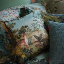 alt="Close up look of a decorative reversible filled cushion with rich plant and flower designs, made of 100% percale cotton with other cushions."