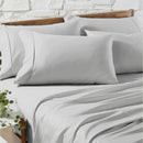 Close-up of silky, smooth silver Egyptian cotton sheets with elegant detail