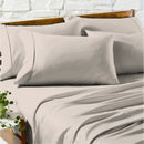 Close-up of silky, smooth sand Egyptian cotton sheets with elegant detail