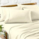 Close-up of silky, smooth ivory Egyptian cotton sheets with elegant detail
