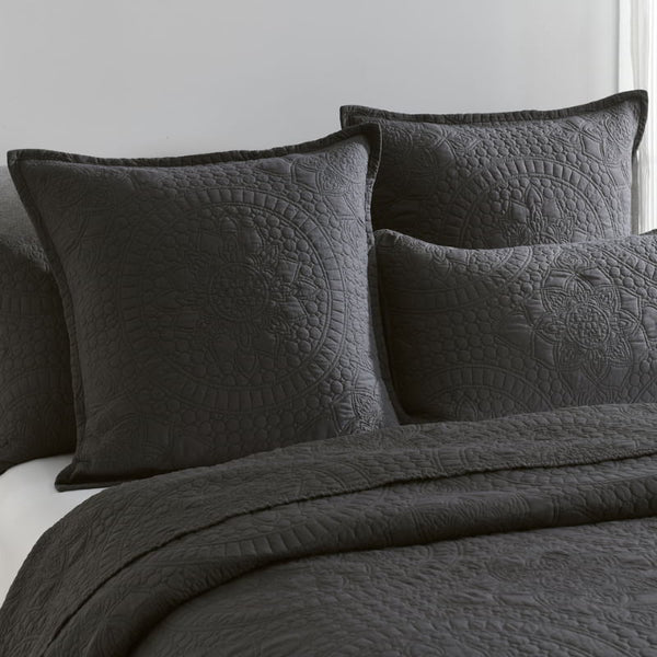 alt="A shade of grey european pillowcase features an inspiration from the ornate detailing of traditional Greek tile patterns.