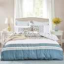 Renee Taylor Benitta quilt cover set styled with Japanese-inspired patterns and patchwork detail