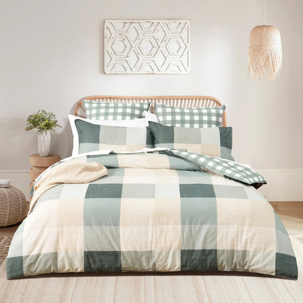 Full bedroom view featuring Cooper Checks quilt cover in a bright, coastal-inspired setting