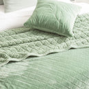 Luxurious eucalyptus colour velvet blanket featuring diamond design.