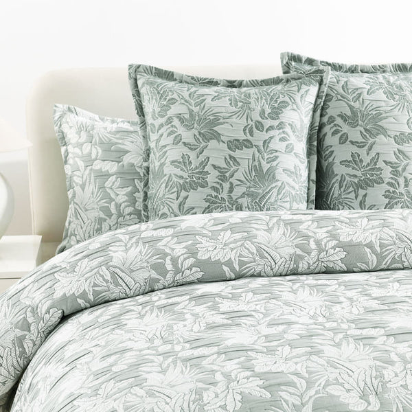 Soft fern leaf pattern in sage green woven into jacquard fabric