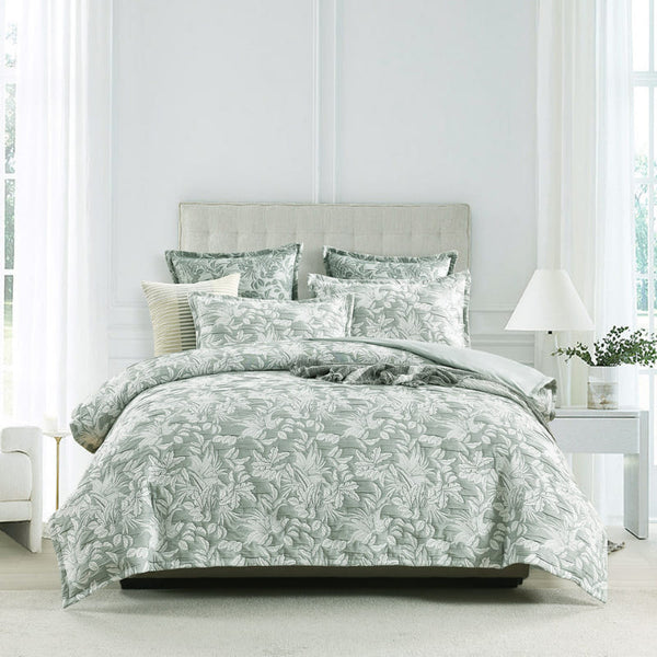 Indiana Fern quilt cover styled in a bright white bedroom with matching pillows