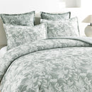 Layered leafy jacquard design on cotton quilt cover with matching shams
