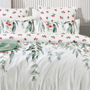 Renee Taylor Mallees quilt cover styled with native floral print in soft green and blush
