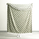 Full size Renee Taylor Jade Throw held up to show generous dimensions and texture