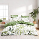 Renee Taylor Noosa Palm green quilt cover set styled with soft tropical prints