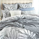 alt="A luxurious, eclectic mix of modern and conventional design quilt cover set that creates a tropical retreat with lush leaves."