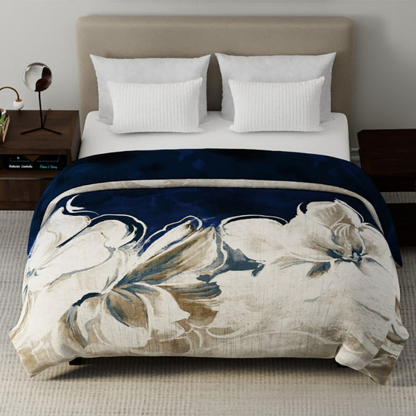 Renee Taylor Snow Drop Mink Blanket styled on a bed with white pillows