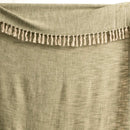 Close-up of Renee Taylor olive throw showing two-tone fringe and chevron weave

