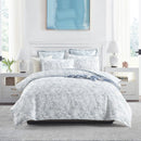 Made bed featuring the Renee Taylor Westley Jacquard Aqua Quilt Cover Set with coordinating pillowcases