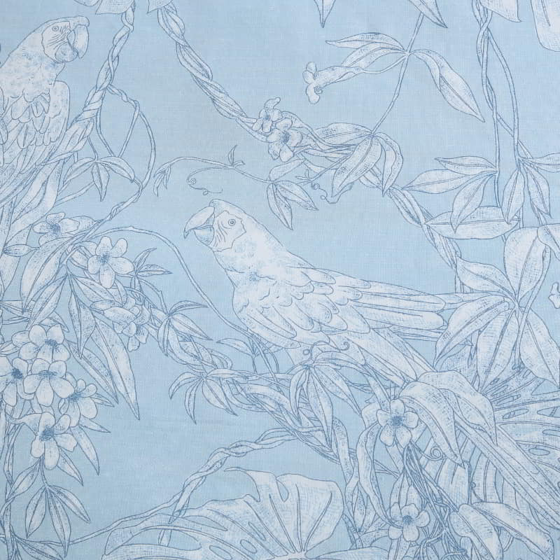 Close-up of cotton fabric showing detailed jungle toile pattern