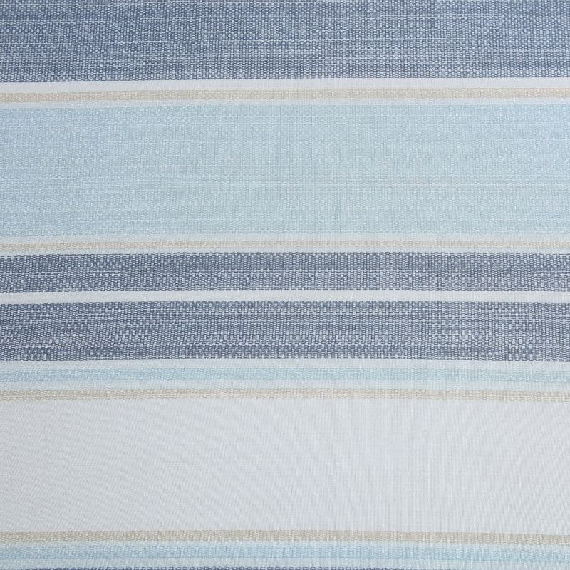 Detailed view of a serene bedroom with a soft blue striped quilt cover set, creating a calming atmosphere for sweet dreams.