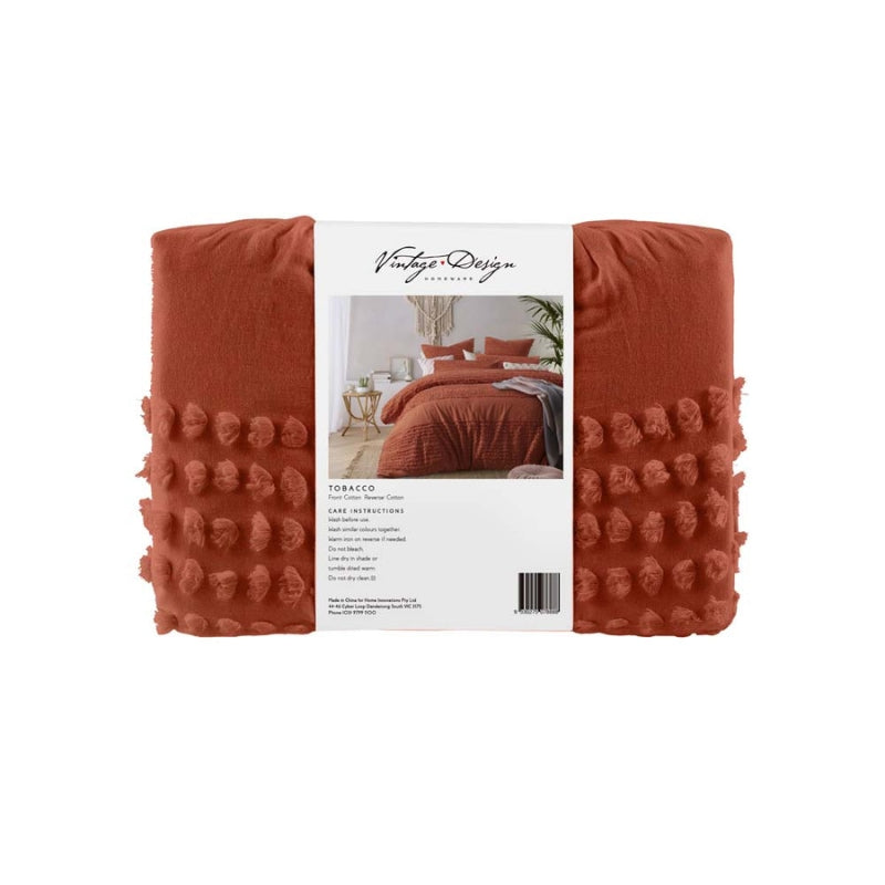 alt text: "Front view packaging of a chenille dot textured cotton quilt cover set for a chic and minimalist bedroom transformation."