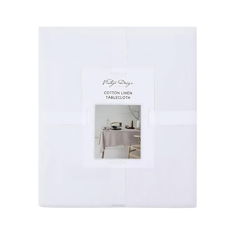 Packaging details of a white cotton-linen tablecloth featuring a unique helm design, tied with a white ribbon, perfect for enhancing your dining decor.