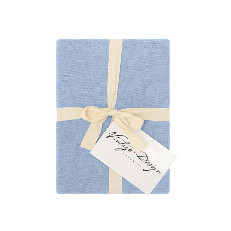 alt="A packaging of a blue plain napkin"