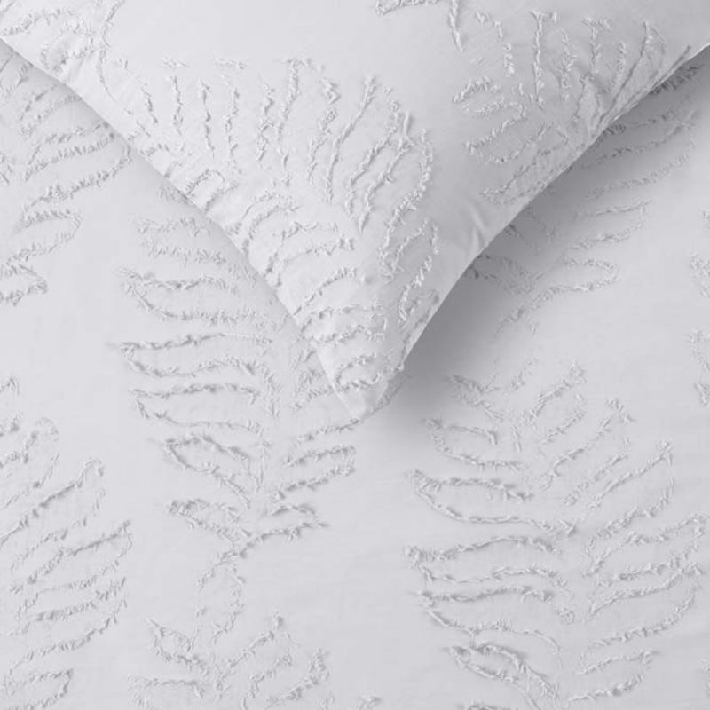 alt="Close-up look of a white cotton chenille quilt cover set, crafted with a textured 100% cotton fabric"