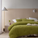 Soft and warm green comforter set with chenille grid pattern for a sleek, minimalist look.