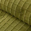 Detailed shot of a soft and warm green comforter set with chenille grid pattern for a sleek, minimalist look.