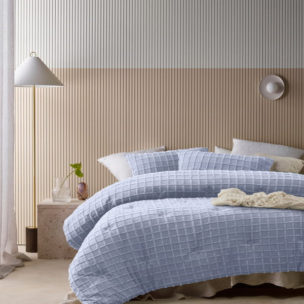 Soft and warm blue comforter set with chenille grid pattern for a sleek, minimalist look.