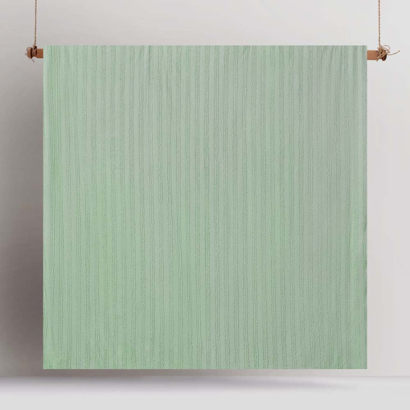 alt="Front details of a sage quilt cover set featuring chenille stripes and minimalistic style"