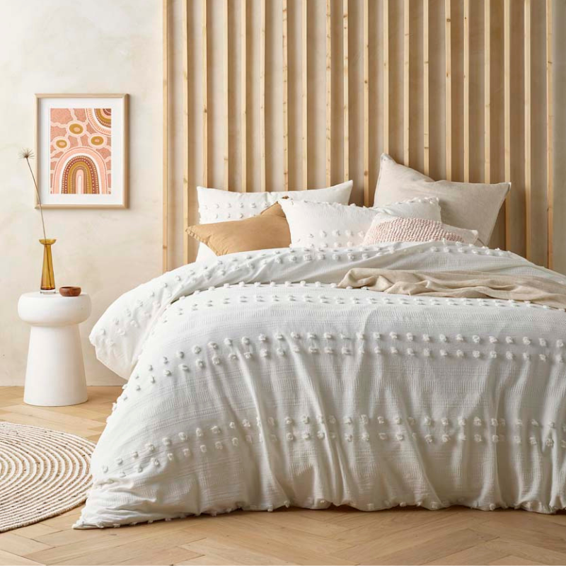 alt="A chenille and waffle pattern quilt cover set in chic minimalist style"