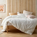 alt="Closer look of a chenille and waffle pattern quilt cover set in chic minimalist style"
