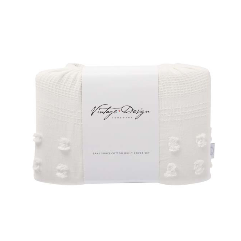 alt="Back view packaging of a chenille and waffle pattern quilt cover set in chic minimalist style"