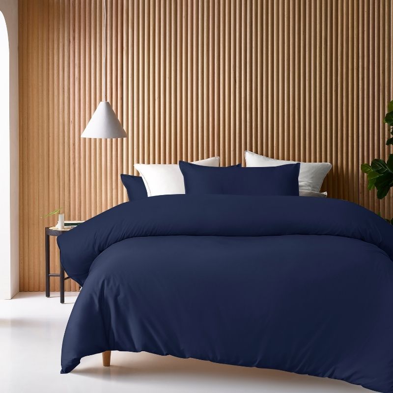 Accessorize Bamboo Cotton Double Stitch Navy Quilt Cover styled on bed.