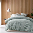 Accessorize Bamboo Cotton Double Stitch Sage Quilt Cover styled on bed.